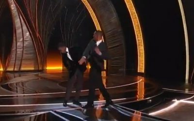 WATCH: Will Smith Rushes Oscar Stage And Socks Chris Rock In The Face For Insulting His Wife