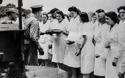 PHOTOS: WWII Army Nurse Veteran Enjoys Parade for 100th Birthday