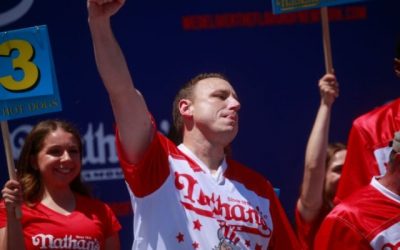 WATCH: Joey Chestnut Takes Animal Rights Protester Down While Winning Hot Dog Eating Contest