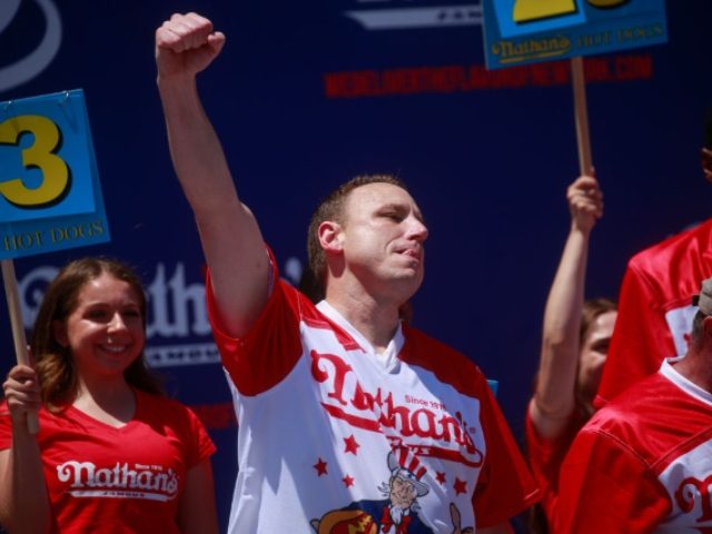 WATCH: Joey Chestnut Takes Animal Rights Protester Down While Winning Hot Dog Eating Contest